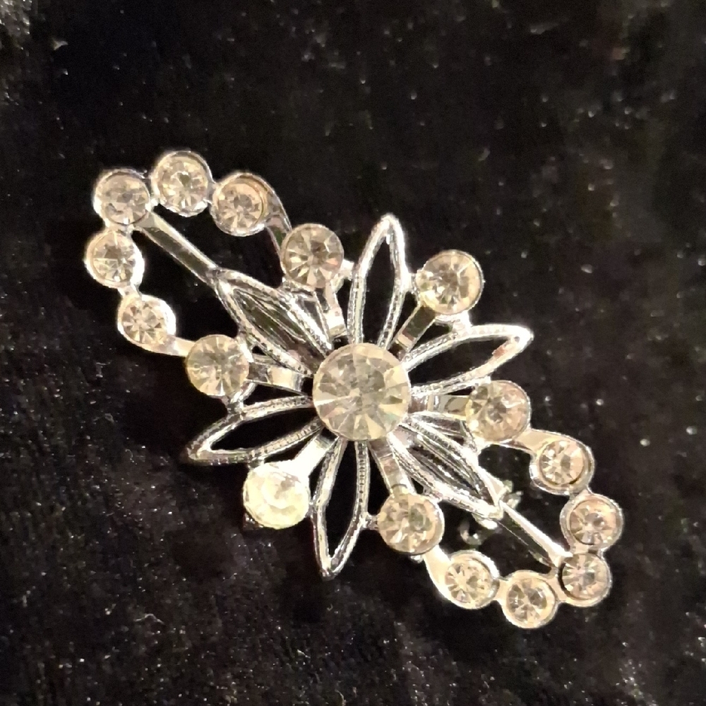 Vintage Silver Starburst Brooch with Crystals